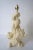 This stylish and chic Sirmos seashell encrusted motif table lamp dates to the 1970s-1980s and is a molded plaster...