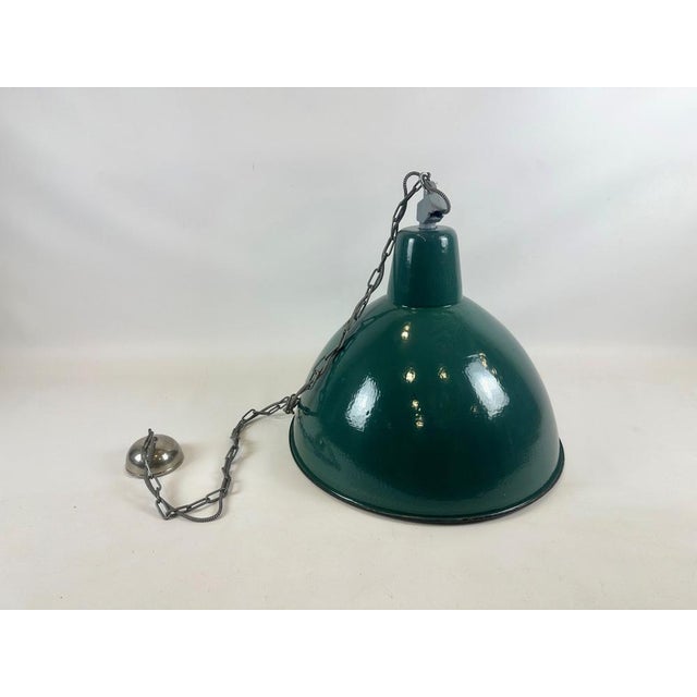 Lamp after comprehensive renovation. It is equipped with a long chain with a braided cable, it can be shortened. A...