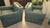 Pair of Bernhardt Aqua Delano Leather Club Chairs with Brass nail head trim. Deep plush seat, with low back and wide arms....