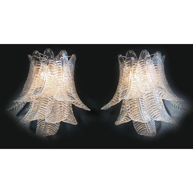 Fantastic pair of vintage Murano wall sconce made by ten Murano transparent six-tier felci for each applique in a chrome...