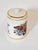 Porcelain jar from the bathroom series by Piero Fornasetti, mid-1900s. With decor of flowers and "Cotton". Signed...