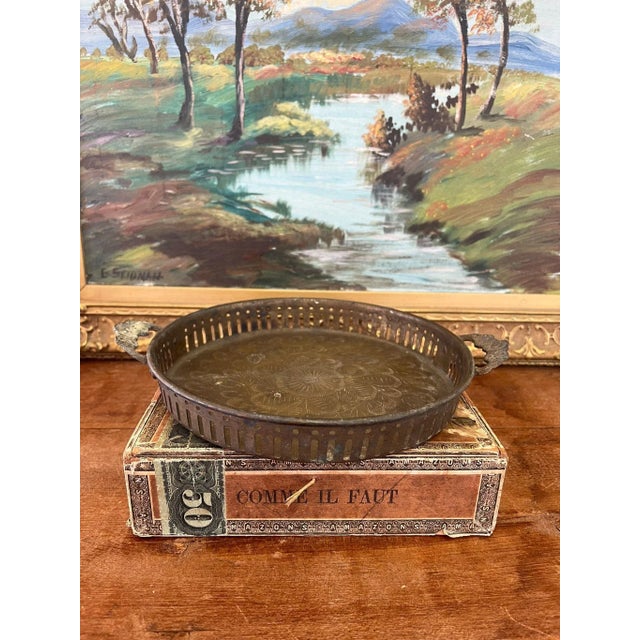 This piece is an India Import, possibly brass tray. This Piece has nice patina and character. Vintage Condition as...