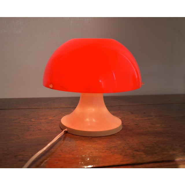 Mushroom-shaped table lamp in a Space Age style. It's from the Valencian brand IXO, as indicated on its base. It was...
