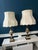 A sophisticated pair of vintage Stiffel table lamps, crafted in enameled brass with a timeless neoclassical silhouette....