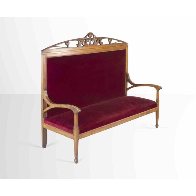 Red velvet sofa is a design item realized in Italy mid-20th Century. A beautiful vintage sofa in wood and red velvet....