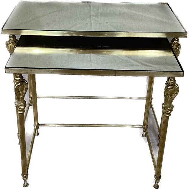 Two elegant nesting tables from the 1960s in beautiful brass, made in the style of Maison Bagues with new custom mirror...