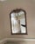 The Jacqueline Vanity Mirror boasts a graceful arched shape that adds architectural interest to your decor. The frame...