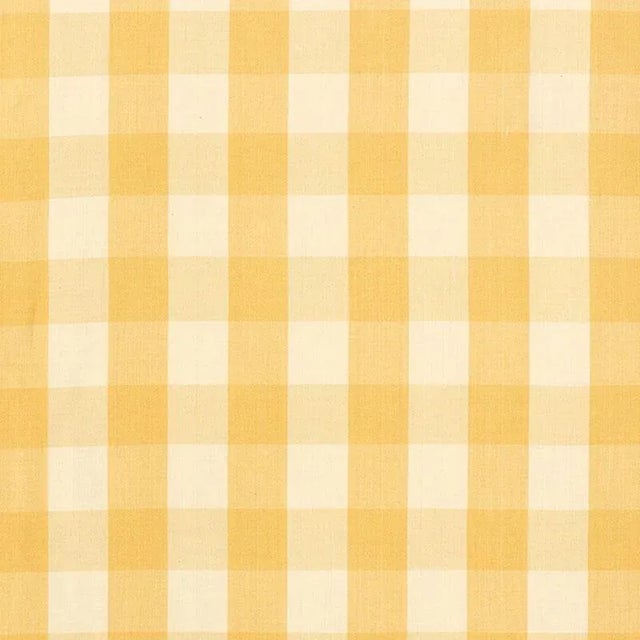 A classic one and a half-inch buffalo check, this woven cotton is a wonderful complement to both prints and plains. Sold...
