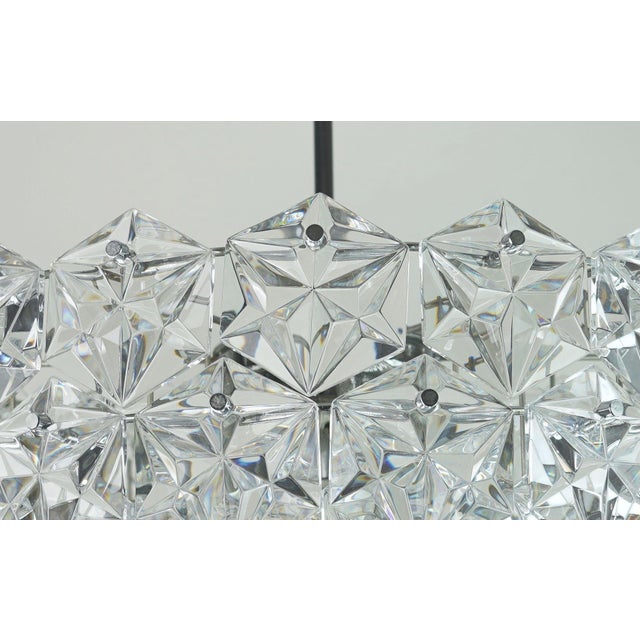 Amazing and elegant pendant lamp manufactured by kinkeldey west-germany in the 1960s. The lamp is made of chrome plated...