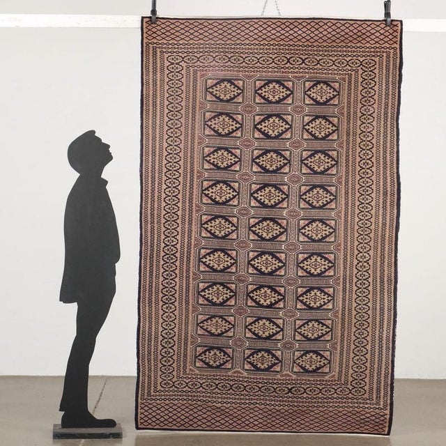 Bukhara rug in cotton and wool, fine knot, manual production. This piece is attributed to the mentioned designer/maker. It...