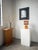 Small wooden (pine) table lamp in a 1980s constructivist style. with its solid wood base and slatted wooden shade, this...