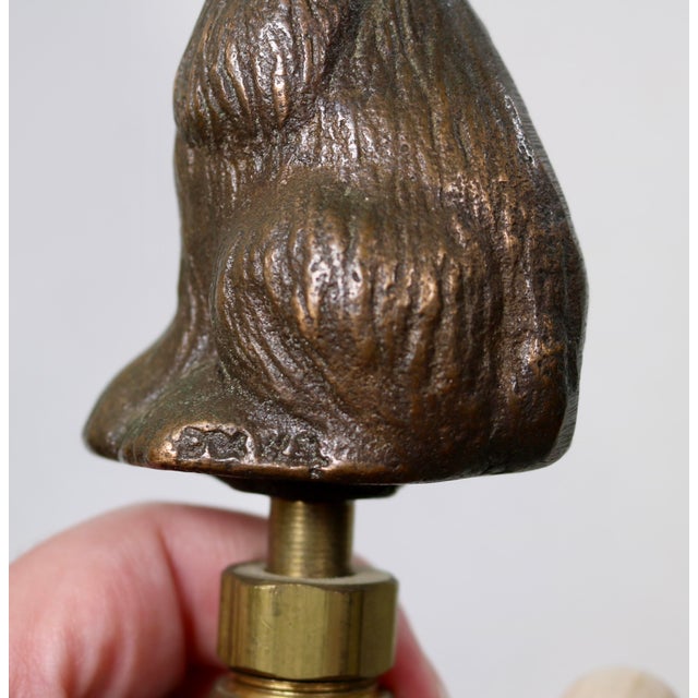 Beautiful bronze dog garden water spigot/faucet. I love how life like this dog is. There is a WS maker's mark on the dog...