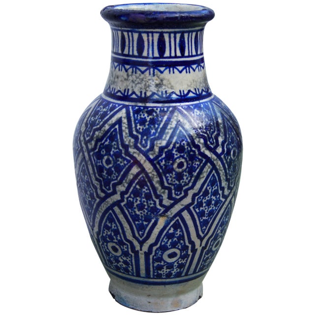 Antique handcrafted ceramic vase from Fez, Morocco with a hand-painted Moorish pattern in blue and white. Maker's mark on...