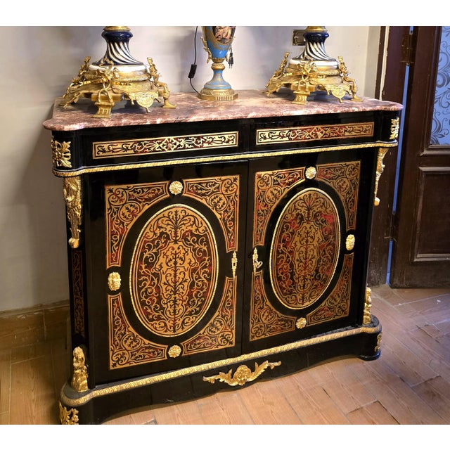 Make a dramatic statement with this magnificent Grand Gothic Revival display cabinet, an extraordinary piece that combines...