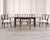 An iconic and rare set of eight mid-century modern dining chairs consisting of six side chairs and two host armchairs...