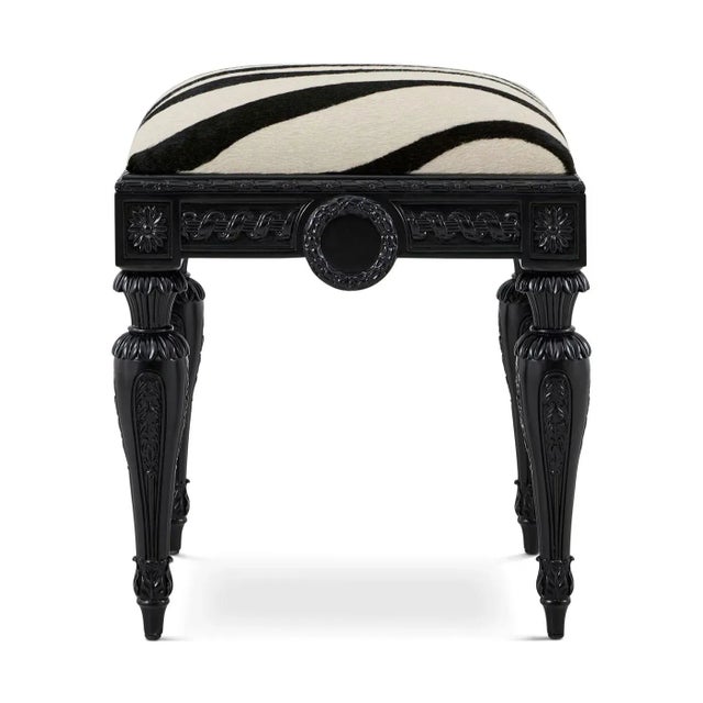Crafted in the style of 18th-century France, this piece features intricately hand-carved floral rosettes, fluted legs, and...