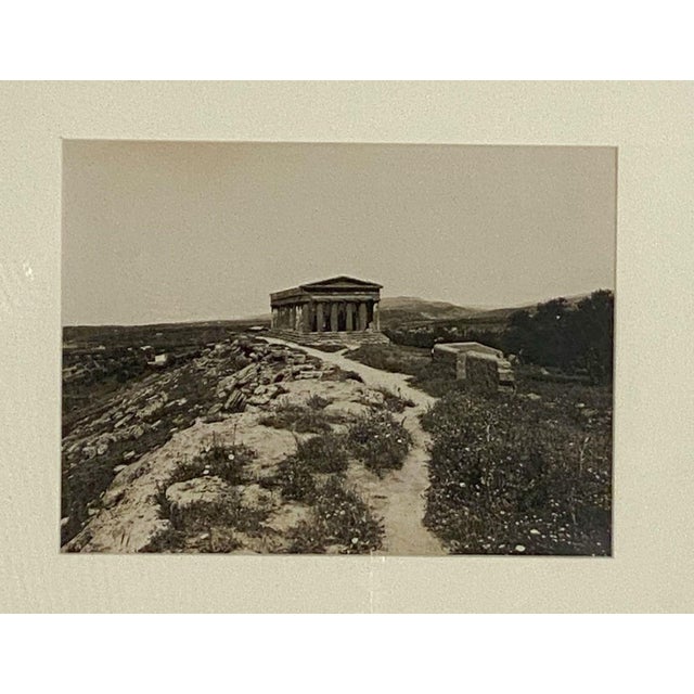 A view of the Southern Italian ancient temple at Paestum, Italy. A late 19th-century Grand Tour photograph of the ruins of...