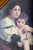 A romantic French Academic image in an unusually beautiful oval presentation, this vintage framed reproduction of William-...