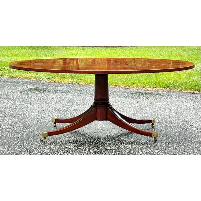 Traditional Regency Style Flame Mahogany Banded Oval Coffee Table For Sale - Image 3 of 8