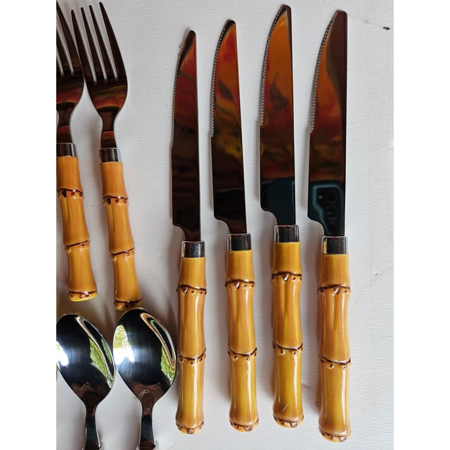 1990s appear unused. 8 place settings all in excellent condition.