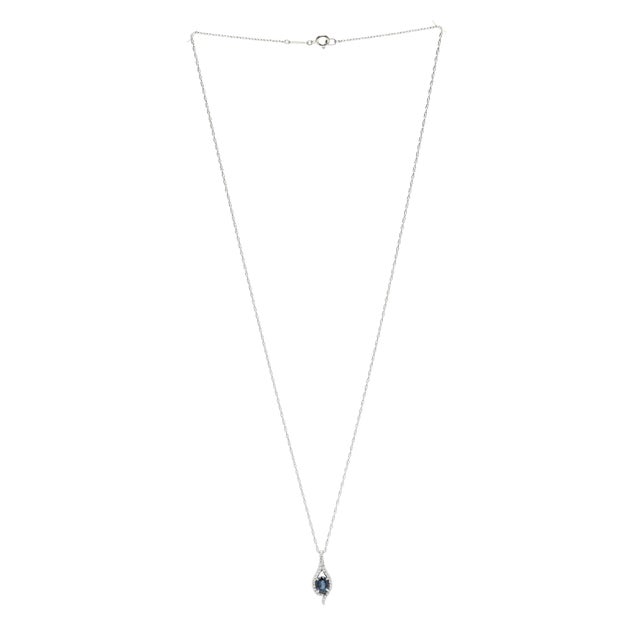 Stones: sapphire, 1 stone oval cut 6 x 4 mm approximately .60 total carats diamonds, 29 stones round brilliant cut .90 mm...