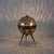 Delightful little mood table lamp from France, circa 1950. The pierced aluminum globe is covered in tiny circle and star...