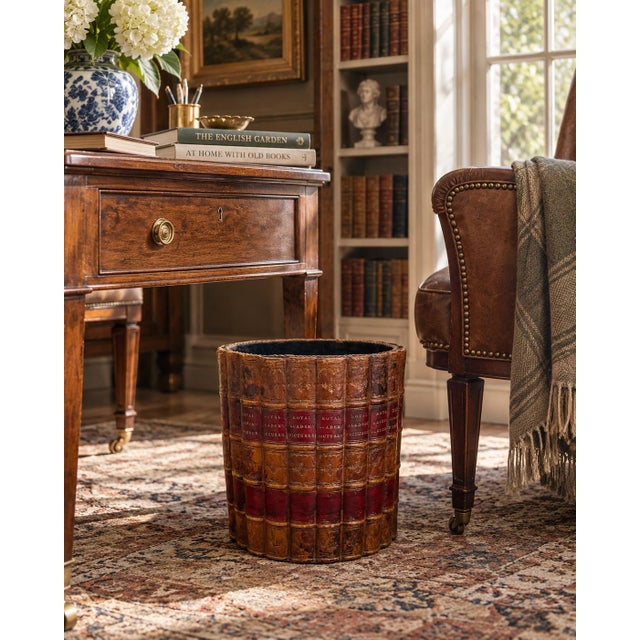 A wonderfully eccentric mid-20th-century English waste basket designed as a circular arrangement of richly aged leather-...