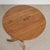 This antique round pine side table is charming with it's softly rounded edges, turned pedestal base and decoratively...