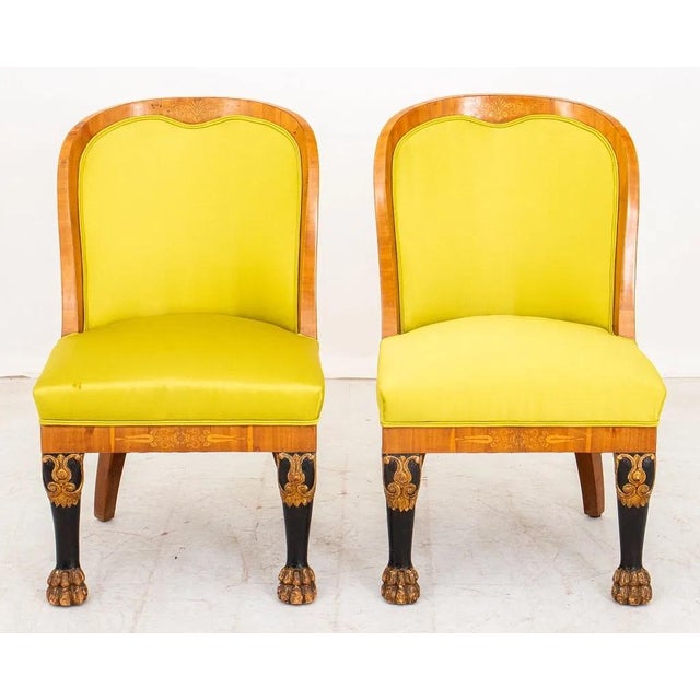 Exquisite Pair of Russian Empire side chairs that have been refurbished and reupholstered in Chartreuse Dedar silk. Made...