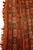 A remarkable antique Andean child’s handwoven wool poncho, preserved today as a compelling example of traditional textile...