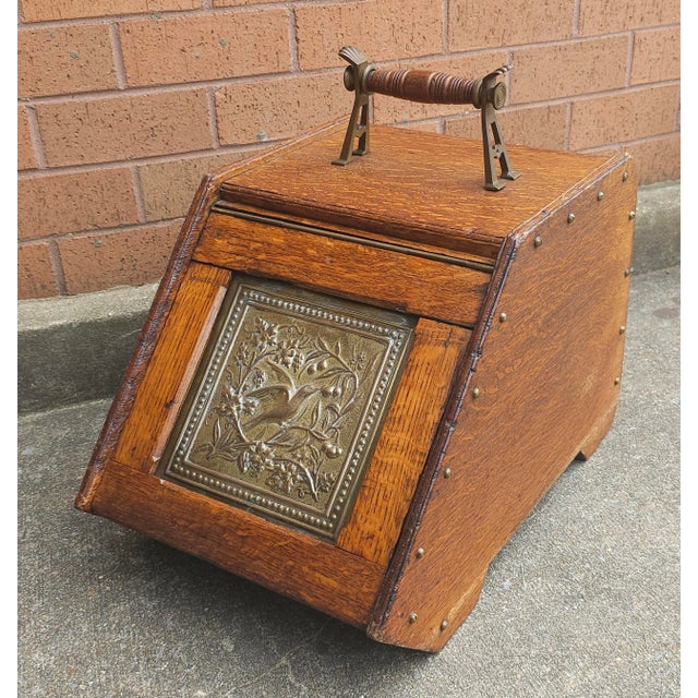 Early 20th Century Victorian Style Oak and Brass Ornate Coal Scuttle. Measures 13" in width, 20.5" in depth and 17" in...