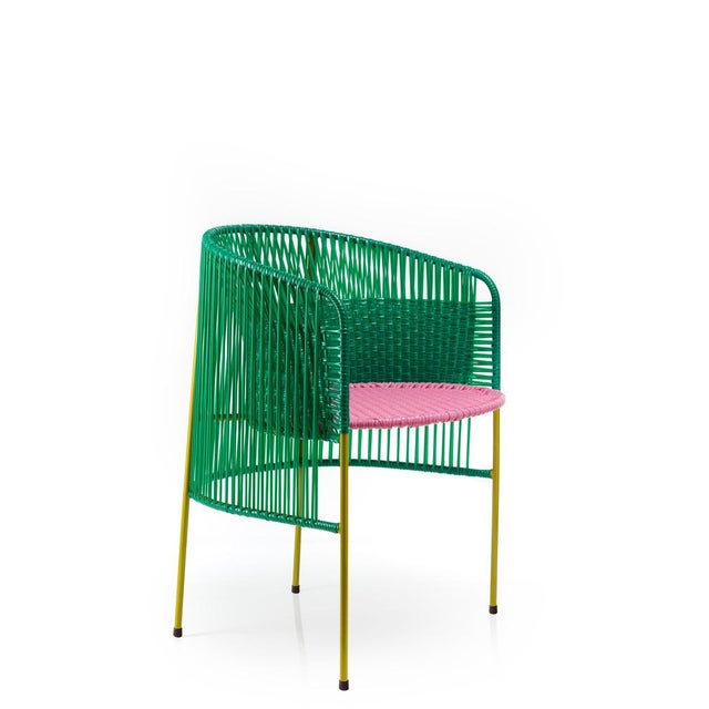 Set of 4 green caribe dining chair by sebastian herkner materials: galvanized and powder-coated tubular steel. Pvc strings...