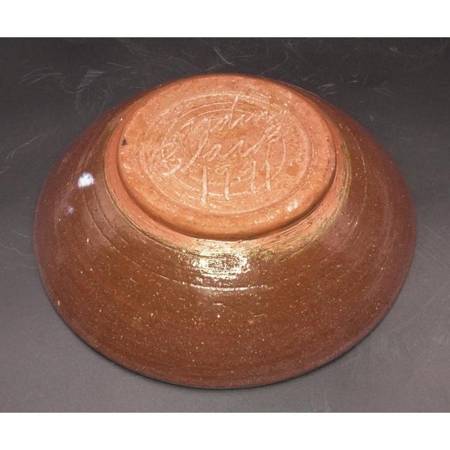 1991 Piranaha fish design pottery bowl in orange, purple and green by Harding Black (1912-2004) Texas. Signed and dated on...