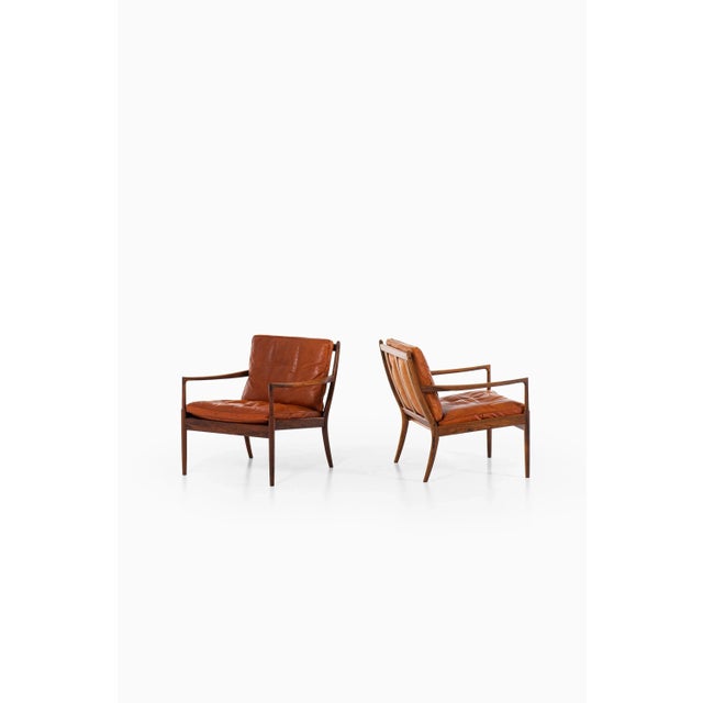 Rare pair of easy chairs model Samsö designed by Ib Kofod-Larsen. Produced by OPE in Sweden. This piece is attributed to...