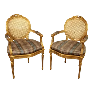Decorative Crafts, Inc. Pair of French Louis XVI Style Caned Giltwood Fauteuil Armchairs