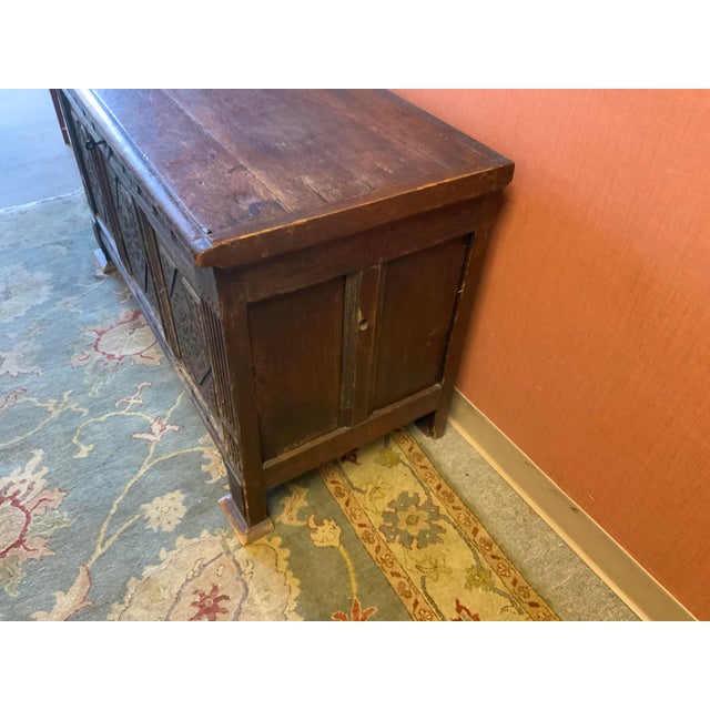 Antique carved oak blanket chest. Has been lined with cedar, not original to piece. Beautiful carved floral details, metal...
