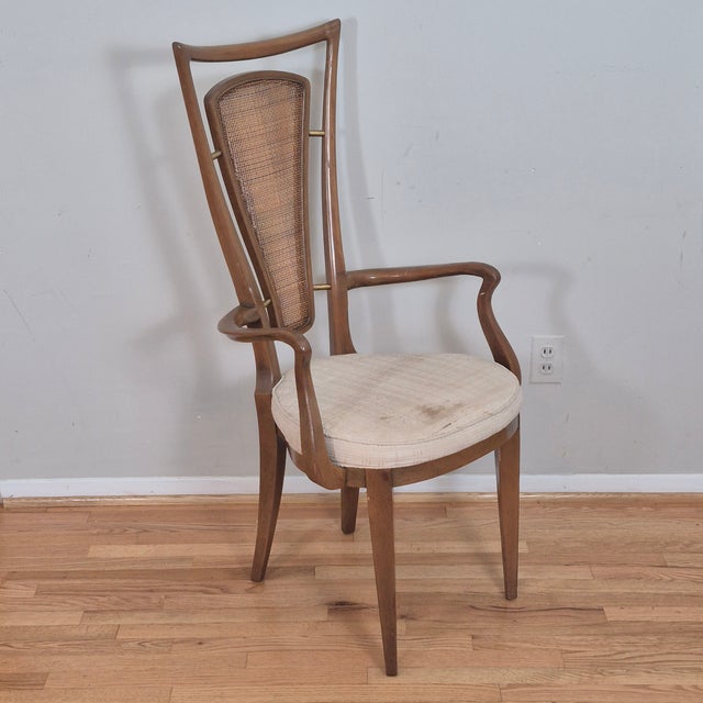 This is vintage midcentury modern style arm chair that is unsigned but was most likely made by American furniture maker...