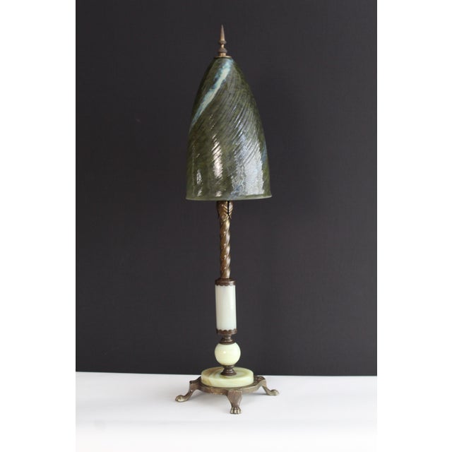 Unusual Tiffany Studios style stained glass lamp. Hand blown art glass shade with Akro Agate glass mounted on antique cast...