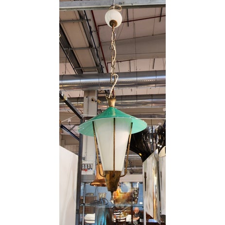 This iconic piece, with its distinctive green and white glass, is a perfect example of Art Deco style, combining clean...