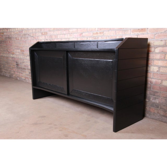 An exceptional mid-century modern ebonized mahogany sideboard credenza or bar cabinet server By Harold Schwartz for...
