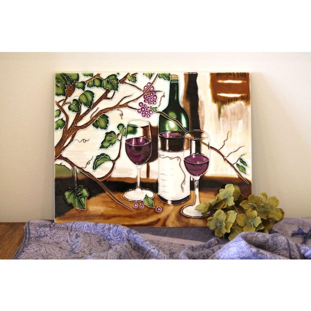 A beautiful tile ready to hang, would make a great addition to any kitchen! Backed with velvet, it has a gorgeous majolica...