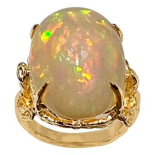 10 Carat Oval Shape Ethiopian Opal Cocktail Ring 14 Karat Yellow Gold For Sale