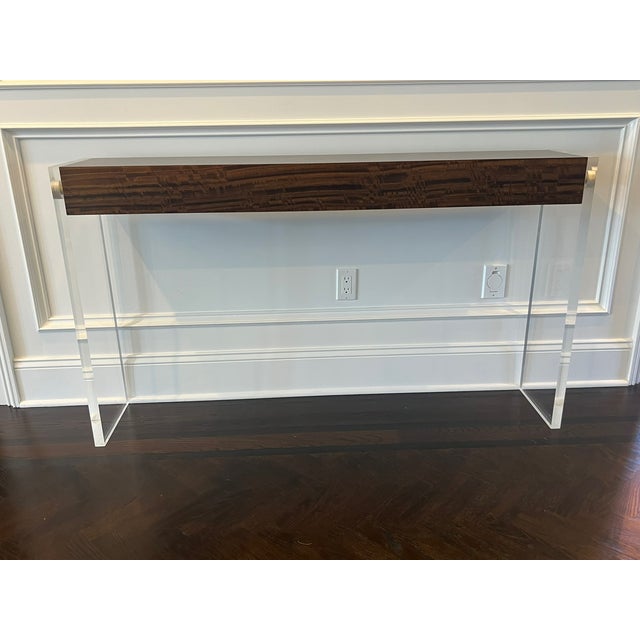 John Richard Aristar Console in Smoked Eucalyptus—Like New Wood and Acrylic console table Thick acrylic legs, thick wood...