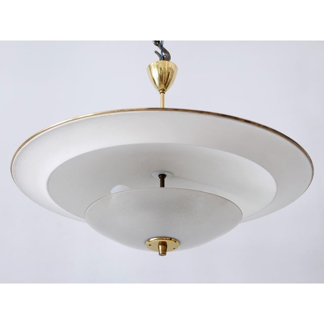 Large, rare and highly decorative mid-century modern 'ufo' ceiling light or pendant lamp. Designed & manufactured in...
