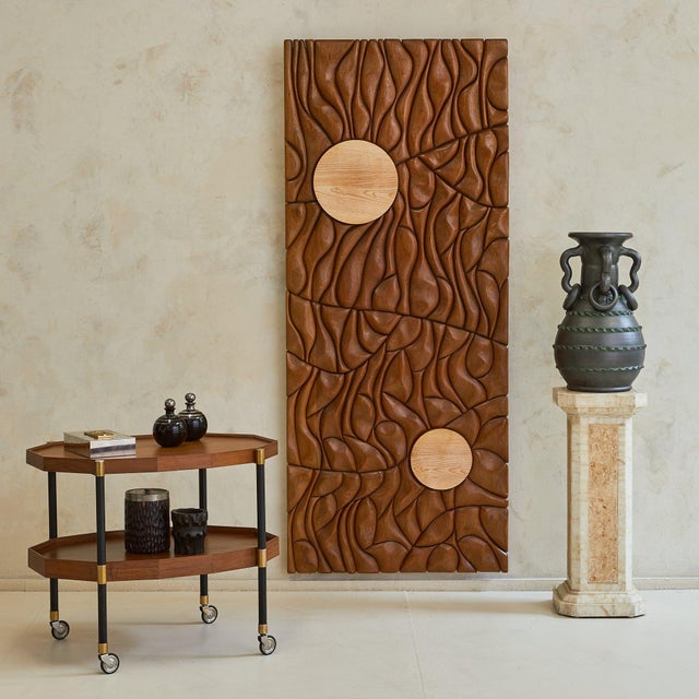 A monumental wall sculpture by Lucien Bénière, standing over six feet tall. In this work, the artist shifts from geometry...