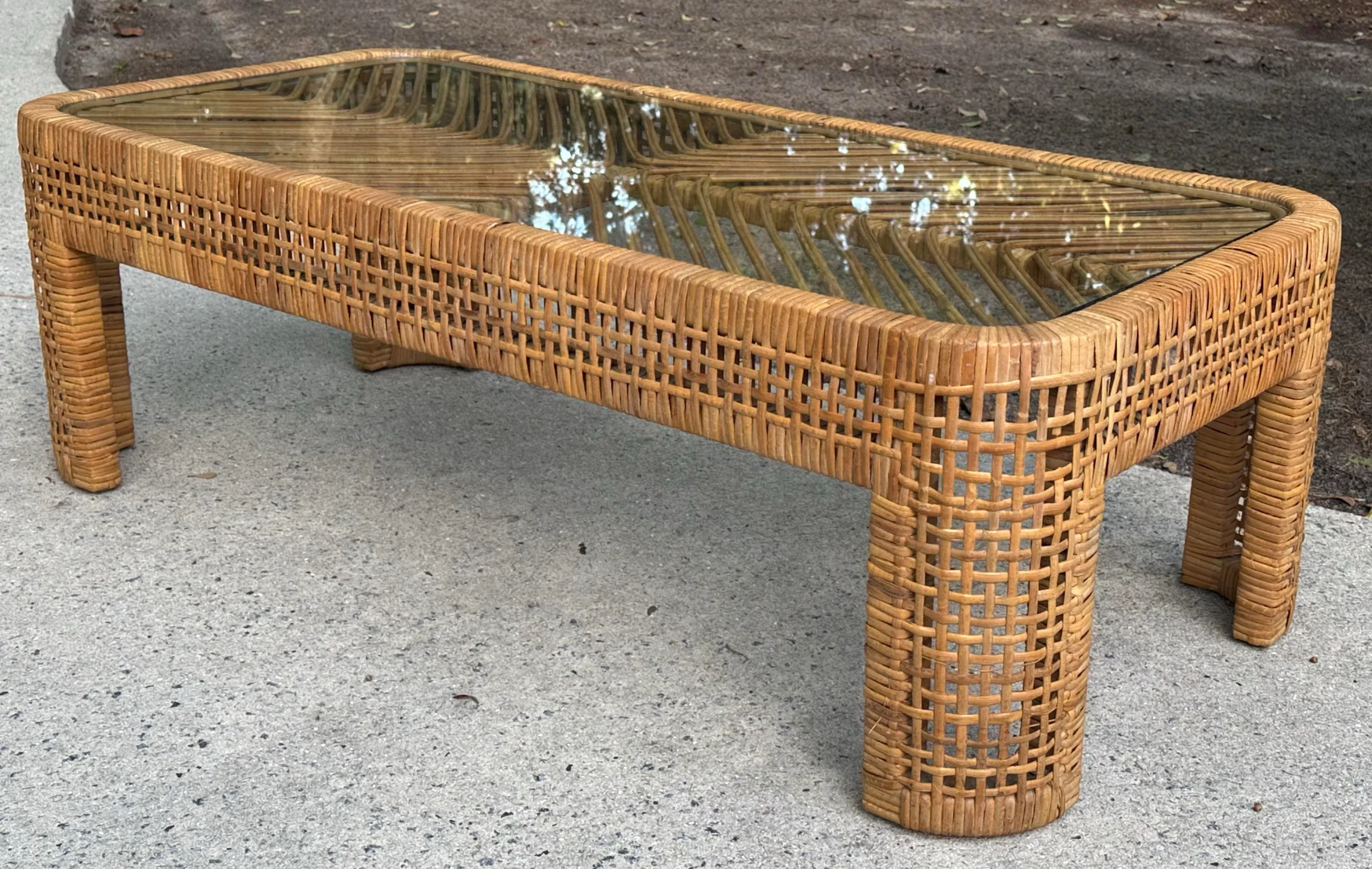 Woven Rattan Coffee Table With Glass Top Over Chevron Pattern