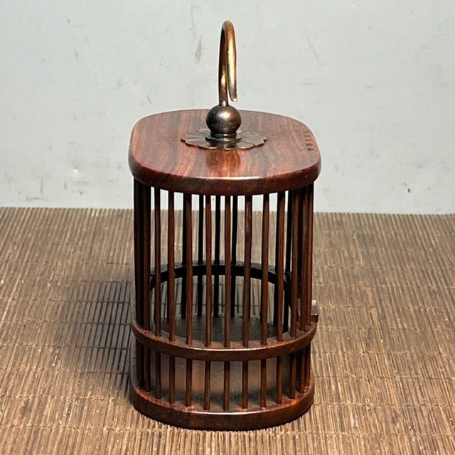 Add a touch of traditional Chinese charm to your home with this vintage rosewood cricket cage. Originally used for keeping...