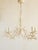 Five lights sculptural Coral motif chandelier in an off-white finish. Featuring hand sculpted of steel tines with a Coral...
