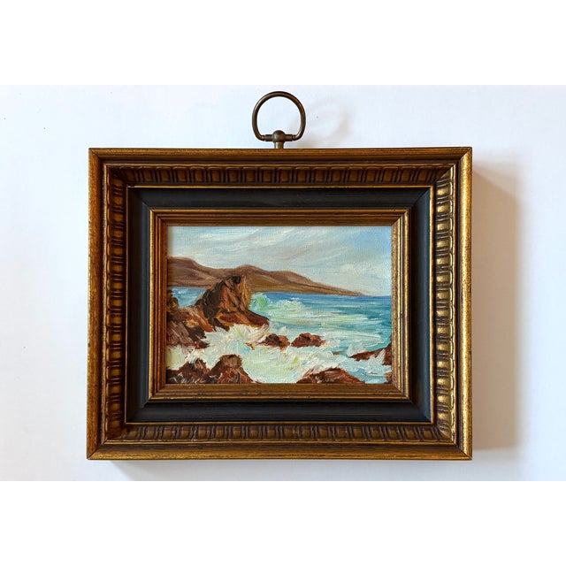 Coastal scene with wave crashing against large brown rocks. The impressionist oil on canvas board, is an Impressive...