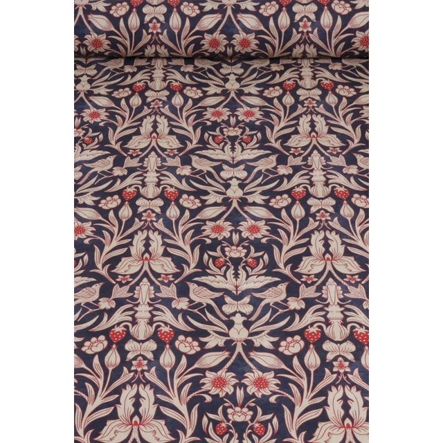 In the style of the classic William Morris design Strawberry Thief, the Strawberry Bird cotton fabric is printed on a 100%...